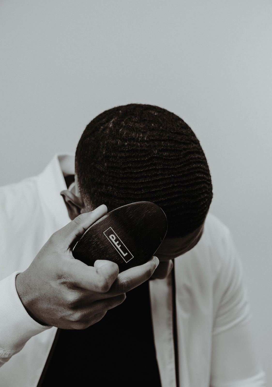 Premium Fade League brush work on natural waves